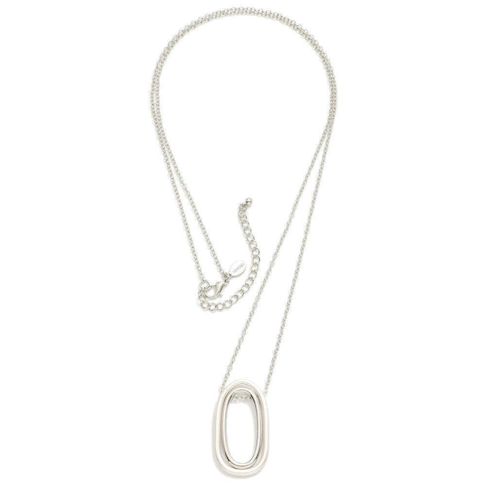 Long Chain Link Necklace Featuring Linked Silver Tone Oval Pendant