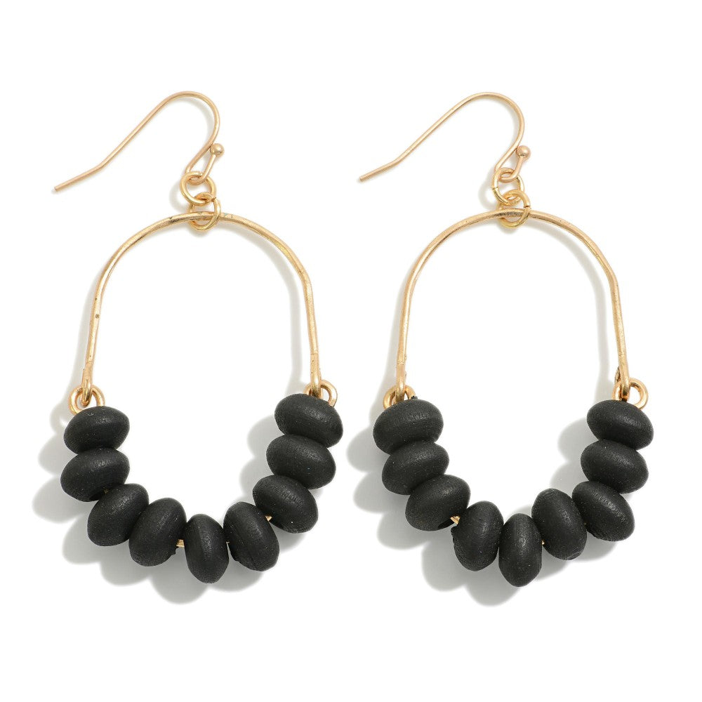 Gold Tone Arch Drop Earrings With Wood Bead Details