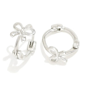 Silver Tone Huggie Hoops With Bow Detail