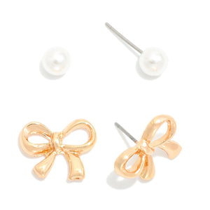 Set Of Two Stud Earrings Featuring Gold Tone Bow & Pearl Stud Earrings