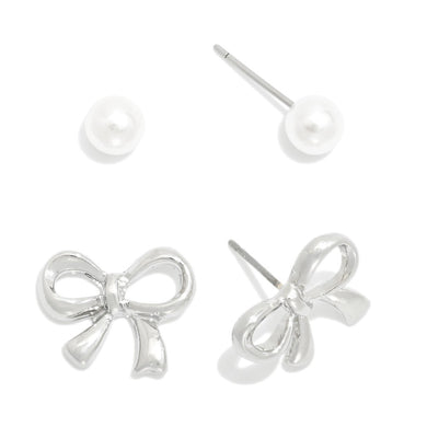 Set Of Two Stud Earrings Featuring Silver Tone Bow & Pearl Stud Earrings