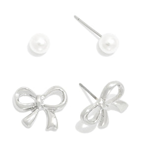 Set Of Two Stud Earrings Featuring Silver Tone Bow & Pearl Stud Earrings