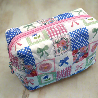 Quilted Stitched Makeup Pouch With Bow Print