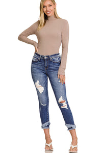 Ladies Mid-Rise Distressed Frayed bottom Jeans Medium Color