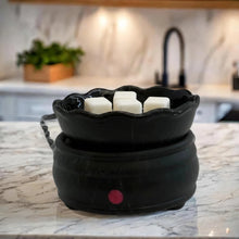 Load image into Gallery viewer, Black melt and candle warmer sitting on kitchen counter. 